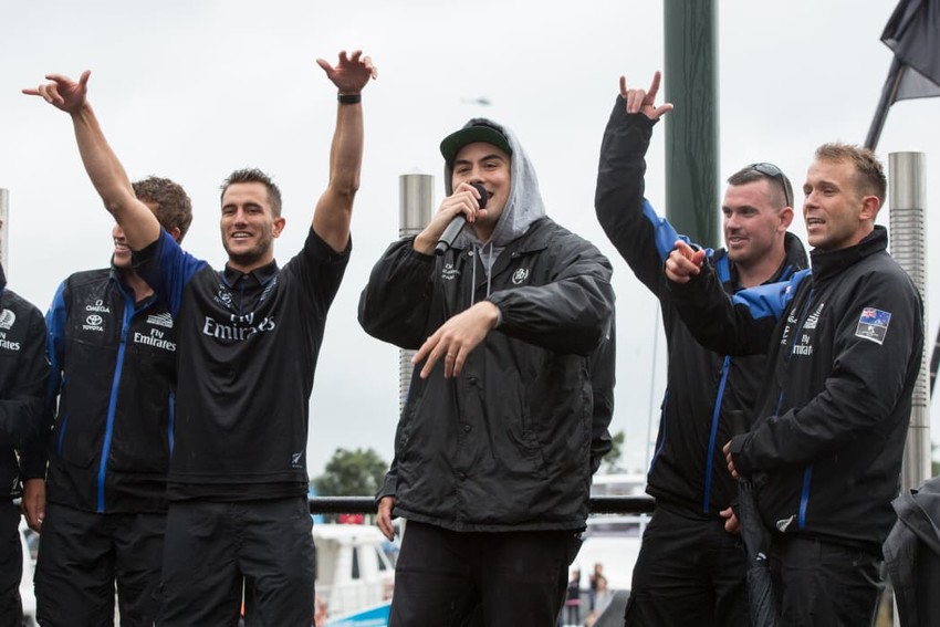 David Dallas performs 'Runnin' with members of Team New Zealand. Photo: RNZ / Cole Eastham-Farrelly