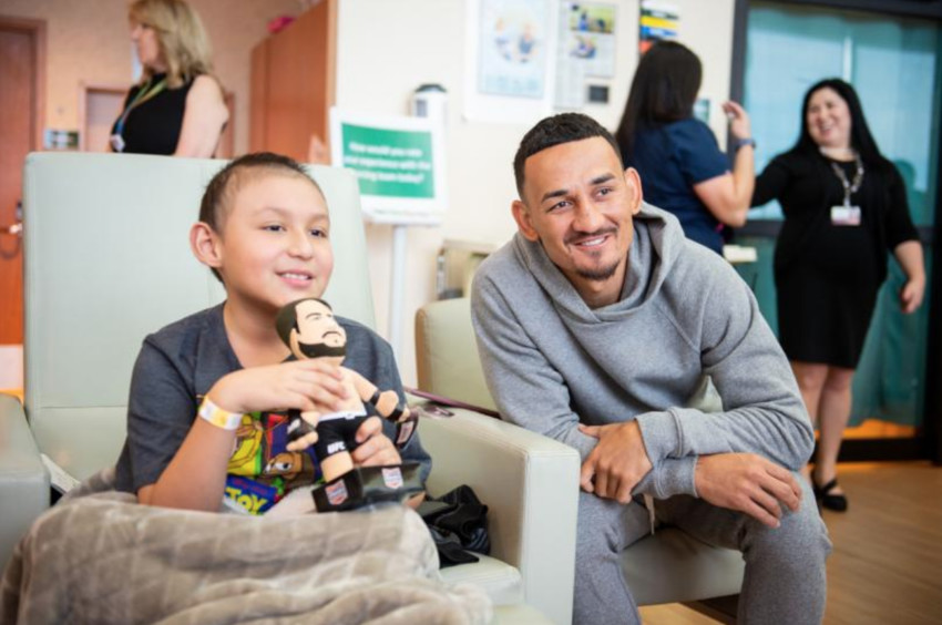 Max Holloway visits Cure 4 The Kids Foundation on March 9, 2020. Photo Credit: UFC