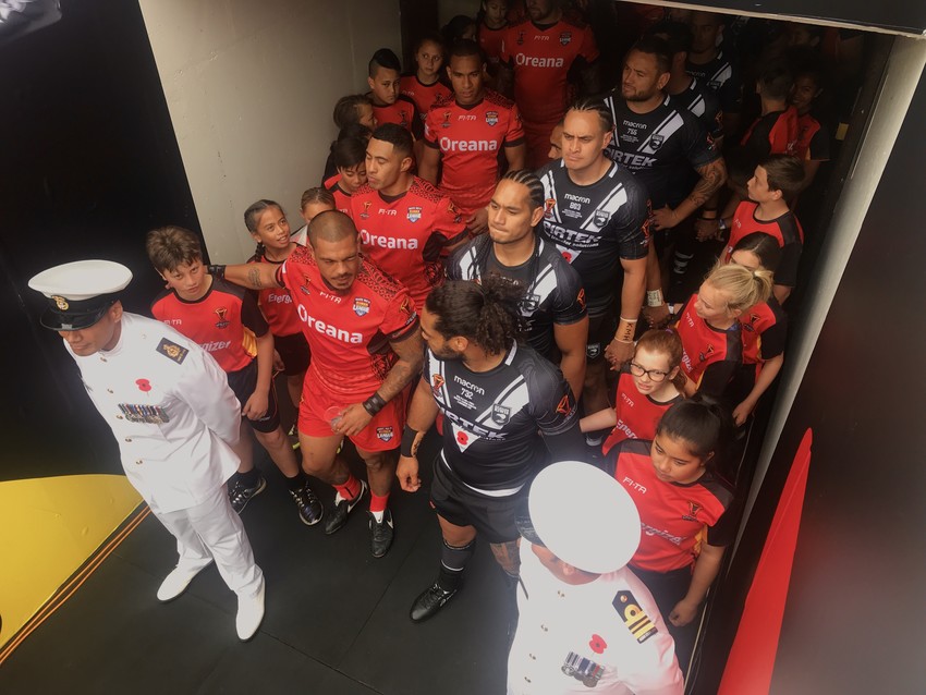 Mate Ma'a Tonga captain Sika Manu & NZ Kiwis captain Adam Blair line up with their teams before heading on to the field at FMG Stadium in Waikato