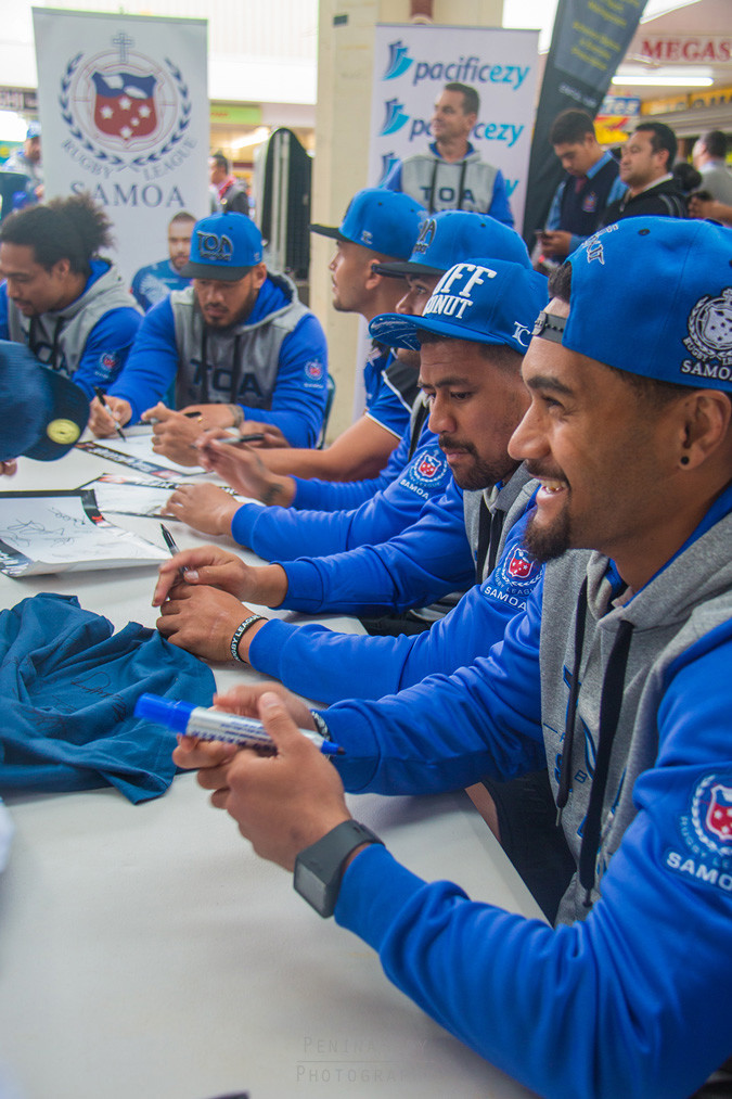 Team signing at the Fan Day in Mangere Town Centre