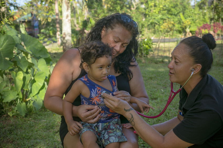 Maui treating a young patient at their home in Muri, Rarotonga