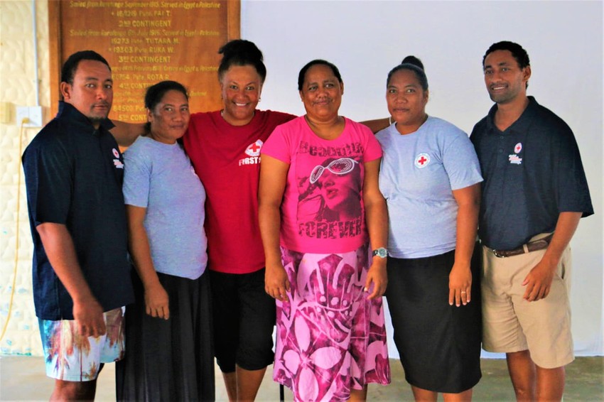 Eipuatiare with Red Cross volunteers