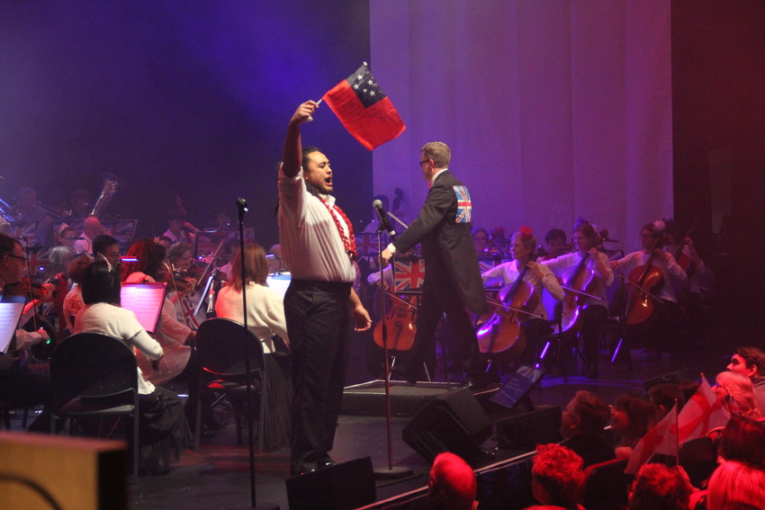 Samson singing 'Rule Brittania' waving his Samoan flag