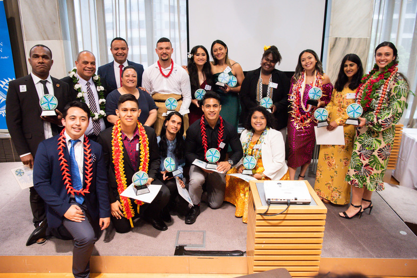 Shaneel winning Pacific Cooperation Foundation Youth Leadership Award