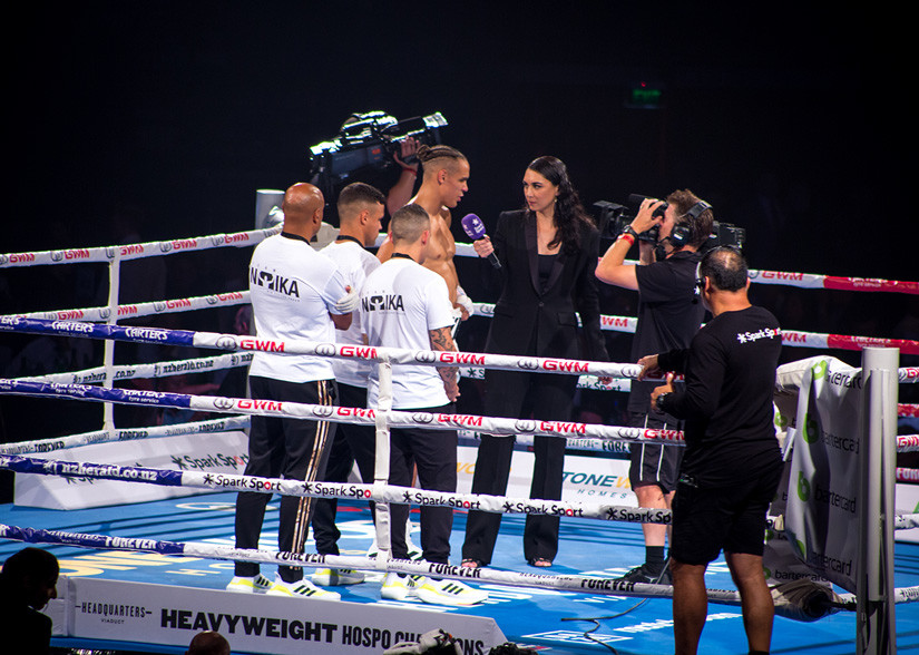 Leilani interviewing boxer David Nyika in-ring on the undercard of the Parker vs Fa night