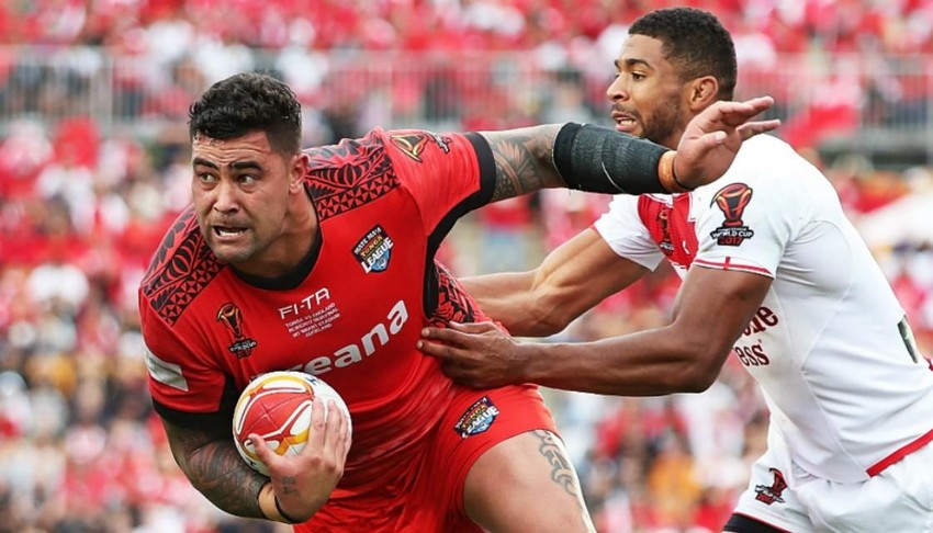 Andrew Fifita breaking through an english tackler in Tongas semi final against England