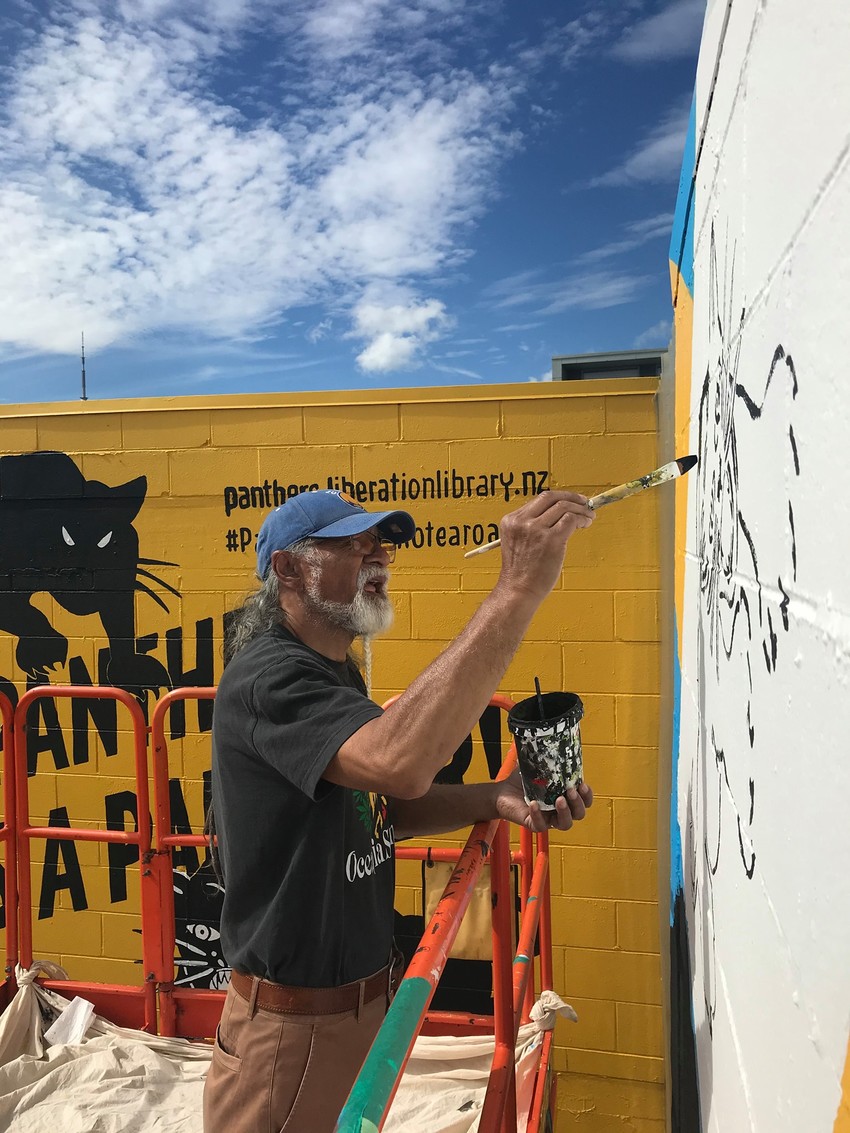 Tigilau Ness hard at work (PC: Liberation Library NZ)