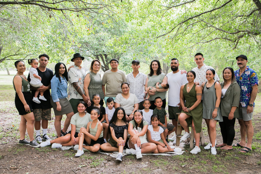 Priscilla with her siblings, Mum, their partners and children