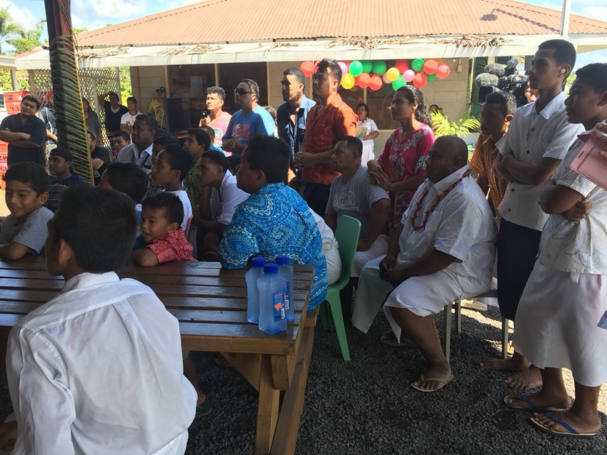 People from Joes village in Faleula watching the fight against Anthony Joshua