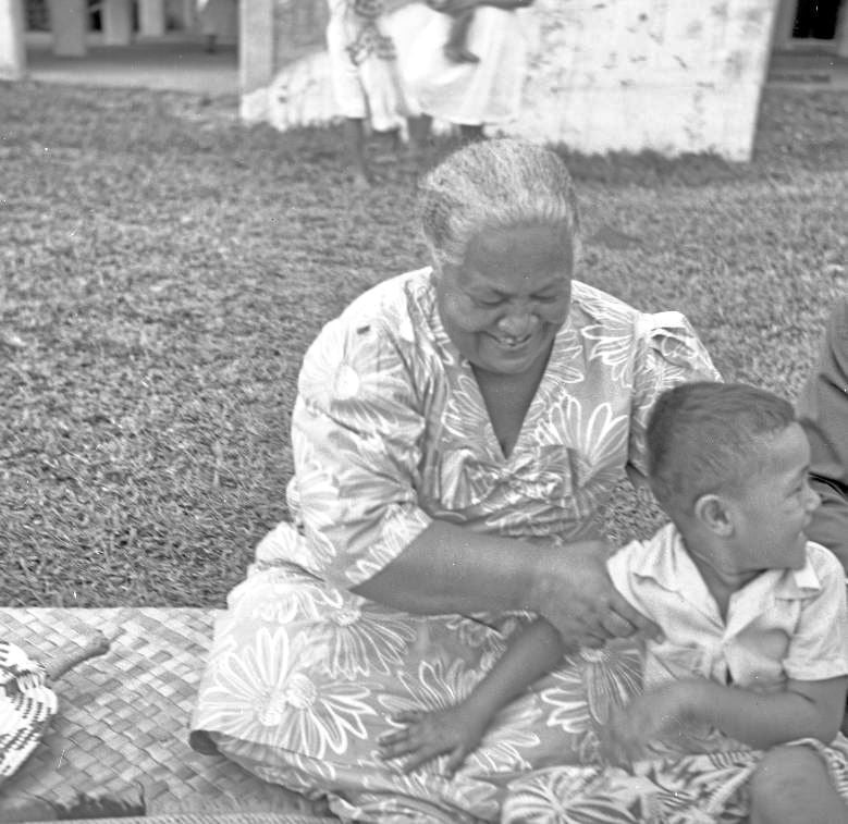 Fa'autu (I'igas wife) outside their house in Apia