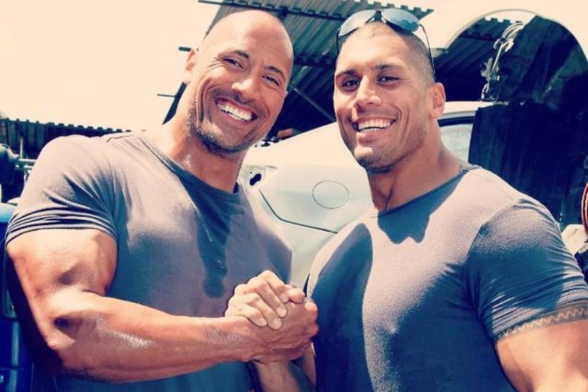 Tanoa'i Reed (R) with the Rock