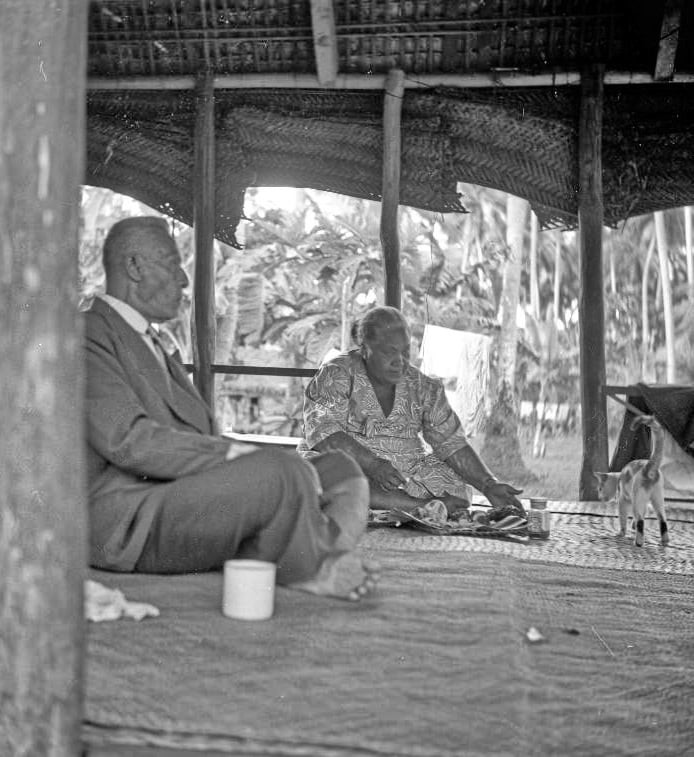 I'iga Pisa and Masiofo (wife) inside the Pisa family home in Apia, 1957.