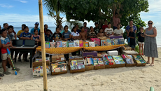 Alo Paopao Academy Receives 20 Laptops And Books From NZ Schools