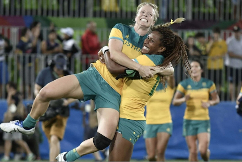 Ellia Green celebrating a win with her Australian Rugby 7s team mate. Photo Credit: Chatta Writer blogspot