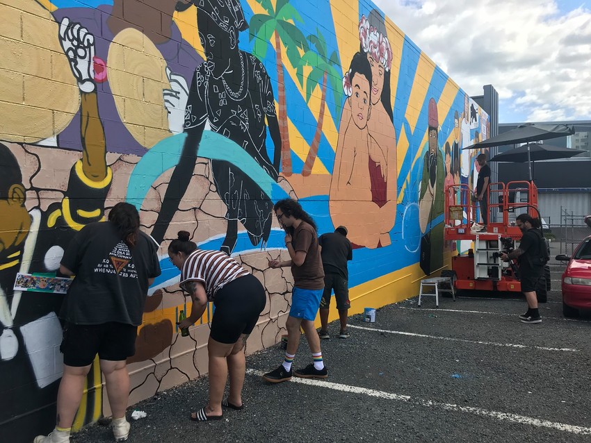 Members of the community coming out to help complete the Panthers Mural (PC: Liberation Library NZ)