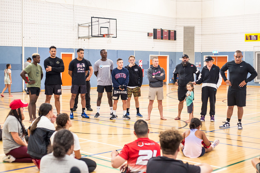 From L-R Blood Diamond, Junior Fa, Carlos Ulberg, Israel Adesanya, Kai Kara France, Brad Riddell, Shane Young, Eugene Bareman, Gina Gee & Sigi Pesaleli