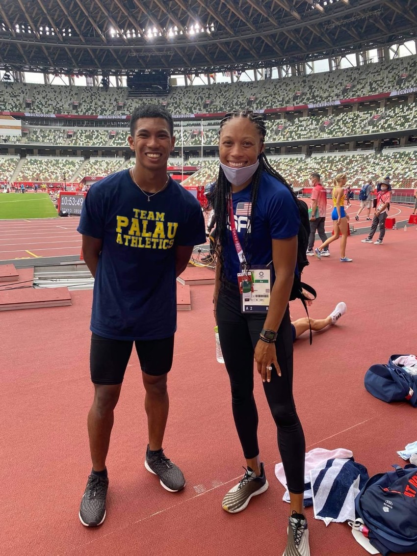 Adrian Illilau with track star Allyson Felix