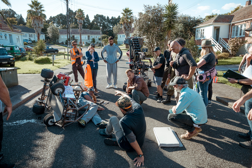 Crew discussing a stunt scene in 'The Legend of Baron To'a'