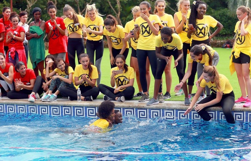 Nanise helping Miss Kenya when she struggled in the swimming event