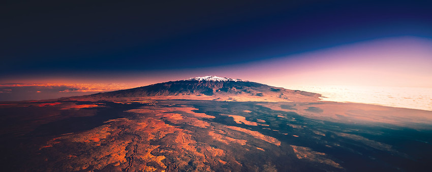 A view of the southern flank of Maunakea from 10,000ft after significant snowfall on Hawai‘i Island. Photo by Andrew Richard Hara for Ke Ola Magazine