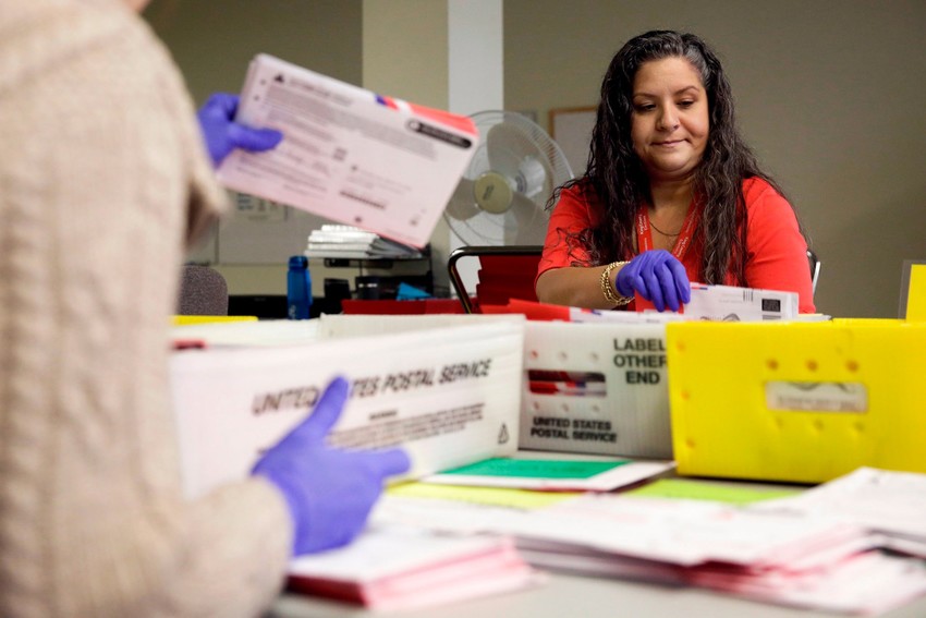 Counting Votes. Photo Credit: New York Times