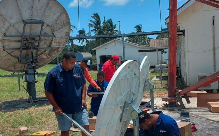 Digicel Tonga’s technical team working on satellite link equipment to restore internet connection Photo: Digicel Tonga