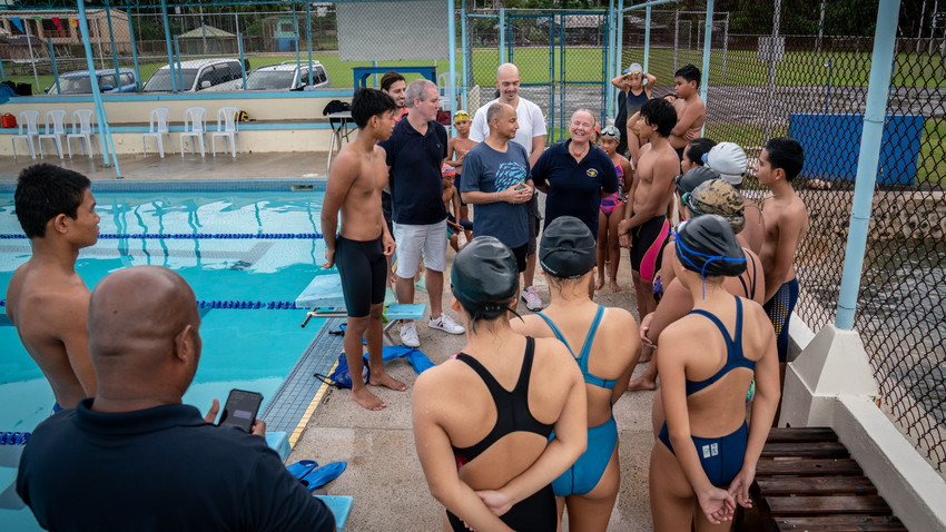 FINA delegation with children in Palau Photo Credit: FINA