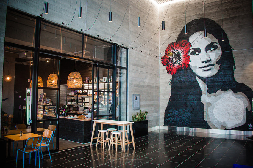 Mural of the original dusky maiden outside Lei Cafe