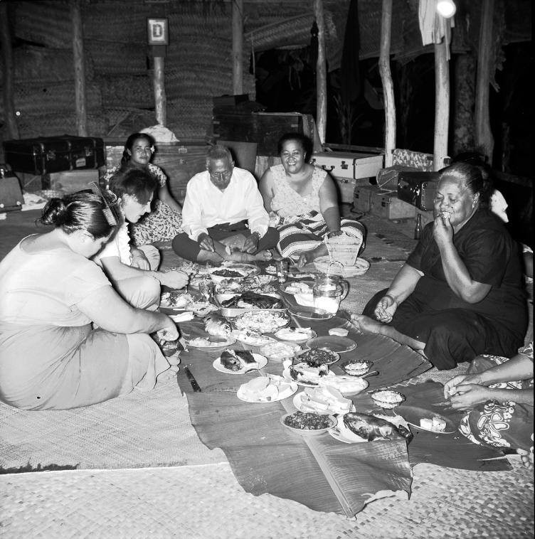 Enjoying a meal with the Pisa household in Apia