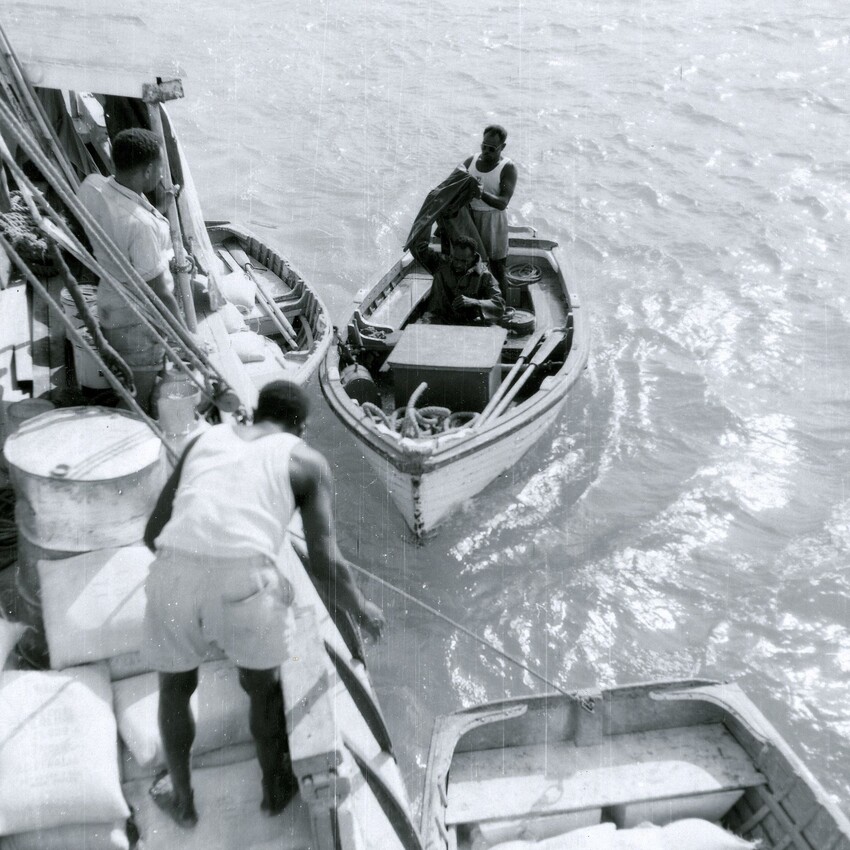 Torres Strait Isladers aboard boat | Image Via AIATSIS