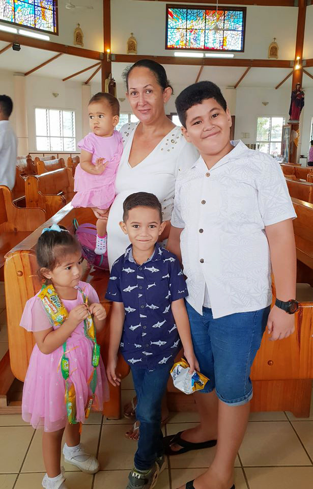 Moli and her children attending church