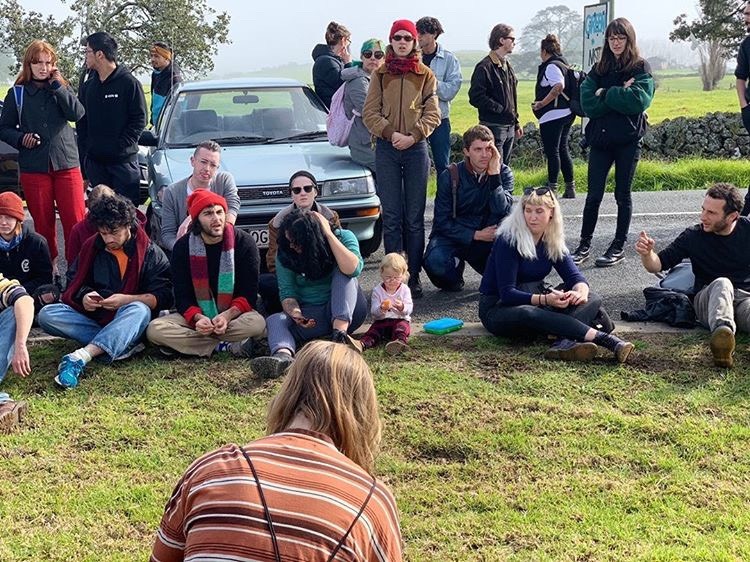 I took this photo in a meeting with the first line at the front blocking the roads because I thought wow! this beautiful little child there eating a piece of fruit & she's part of the Revolution - Poetik