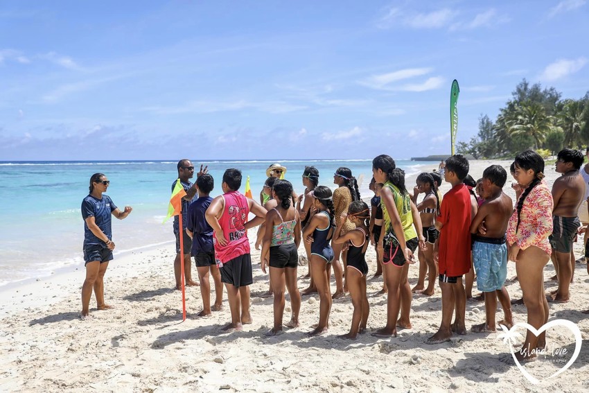 Lesley and Kieran Chan taking Apii Nikao students for swimming lessons