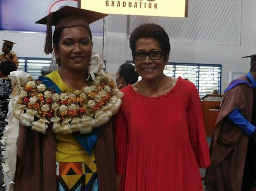 Peta with her sister on graduation day