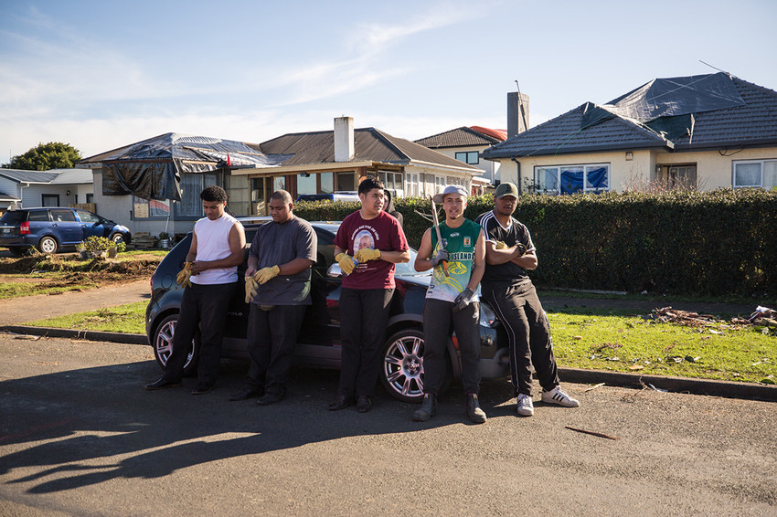 Jordyn & friends from Aorere College taking a break from the cleaning outside his home