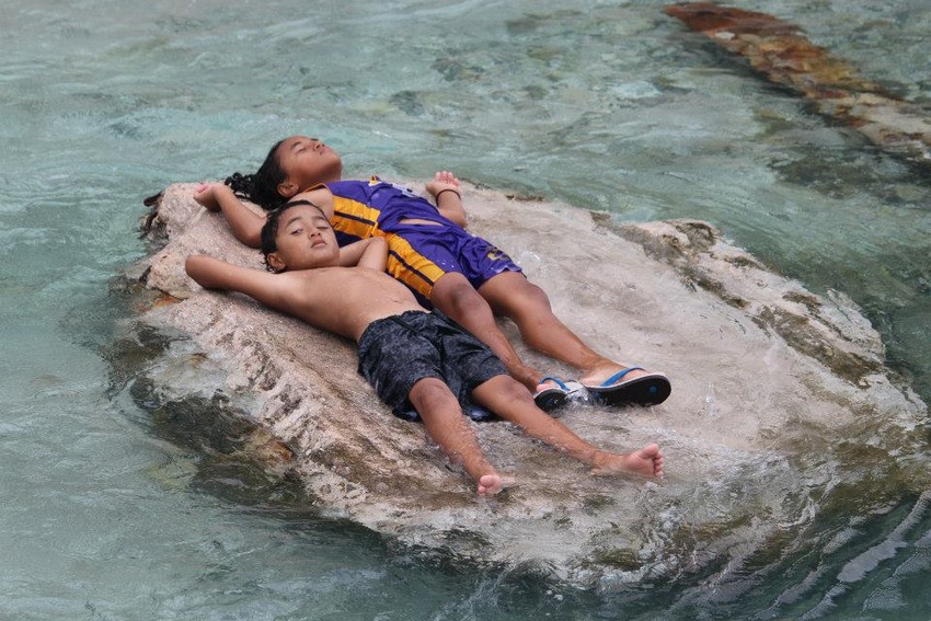 Kids laying out in the sun in Tokelau