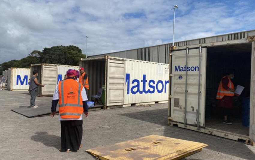Shipping containers at Auckland's Mt Smart ready be filled with donations for Tonga. Photo: RNZ / Lydia Lewis