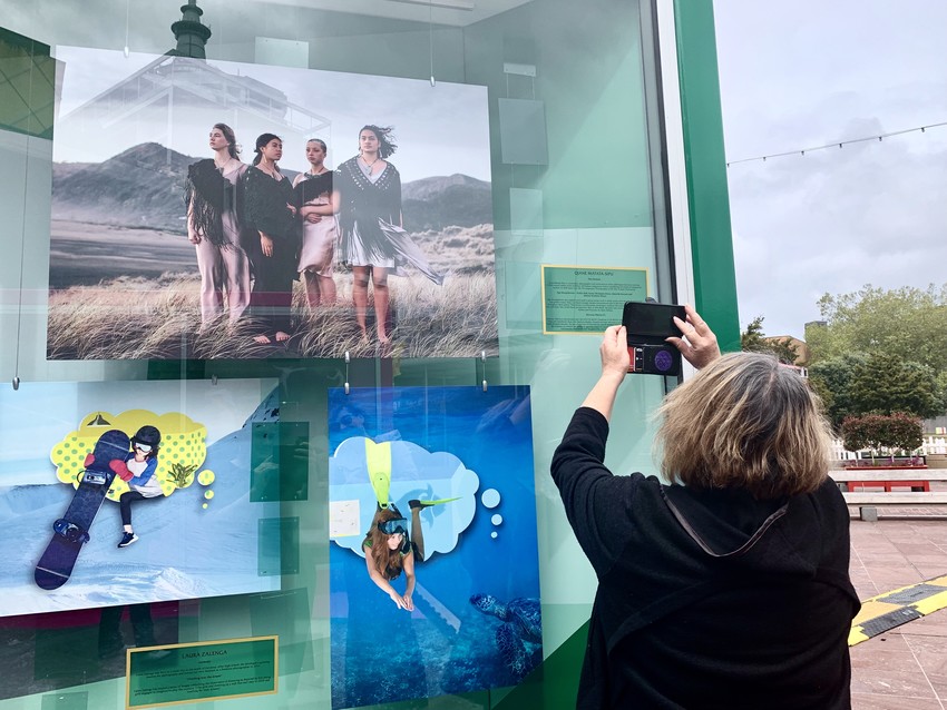 Dream Big Princess Exhibition (Qiane's Mum Karen taking a photo of the image Qiane took of Hinepukorero)