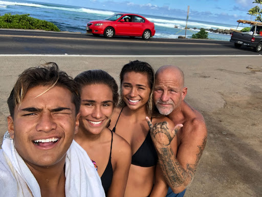 Lucy with her Dad and siblings