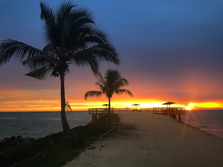 Sunrise over the deck on Amoa's pier before breakfast