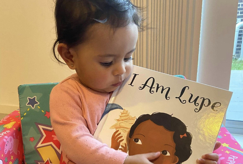A young reader of "I Am Lupe"