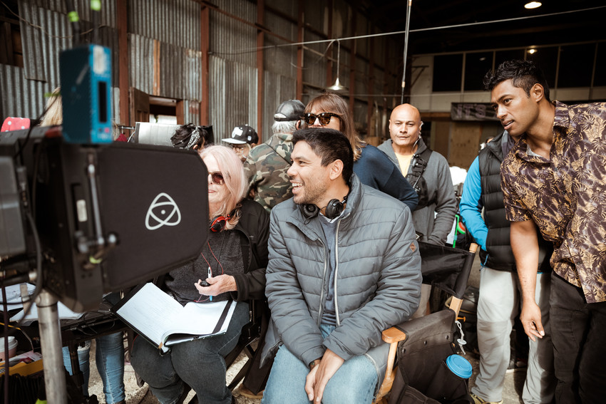 Director Kiel McNaughton behind the monitor with Uli and the crew