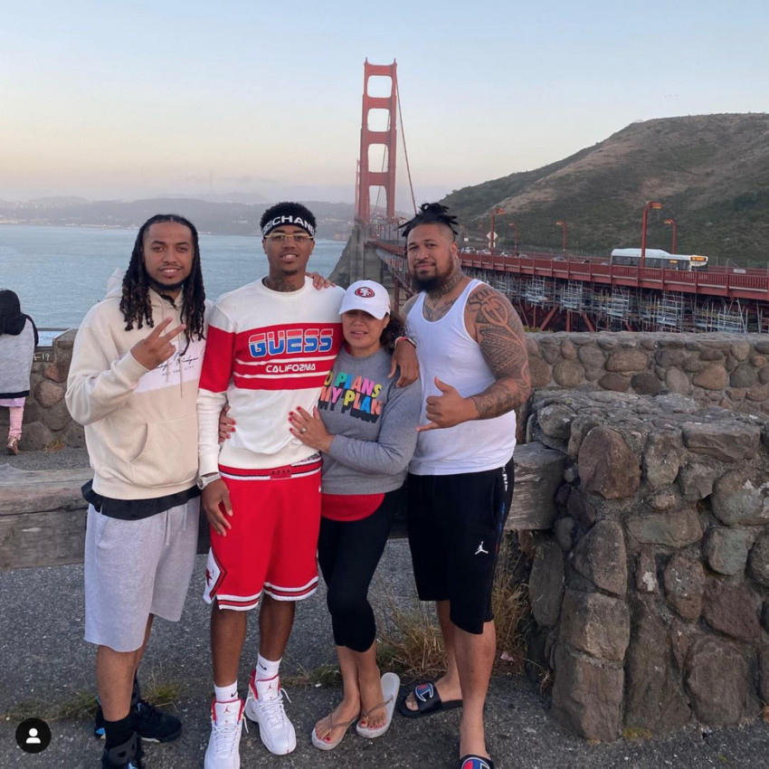Kendrick with his Mum Luisa and brothers