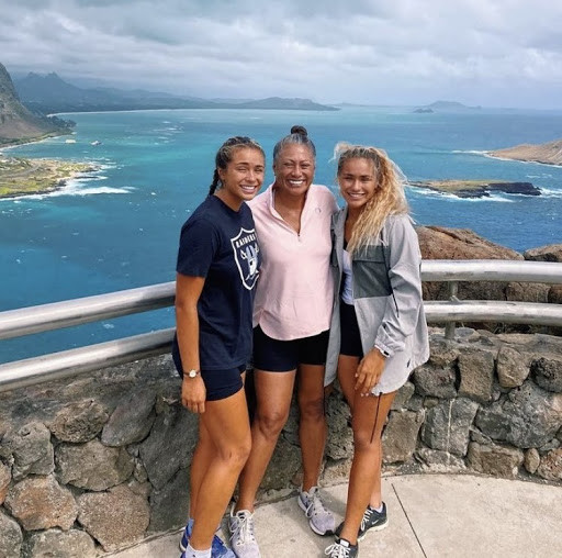 Lucy with her sister and Mum