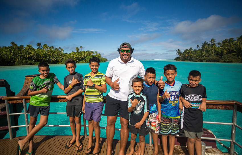 Arerau onboard the Aitutaki lagoon cruise that he is Cruise Director on with some of the local kids (including a couple of his own)