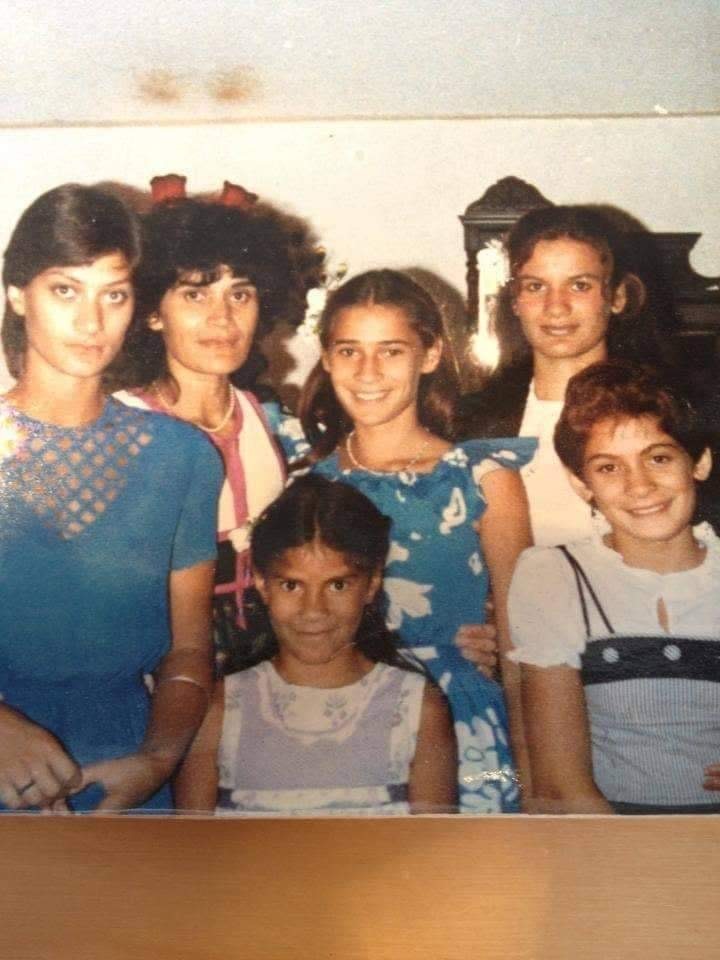 1980s Family Wedding, Mum and her girls Shell, Mans, Ema, myself and Meli. Purple lipstick was in!