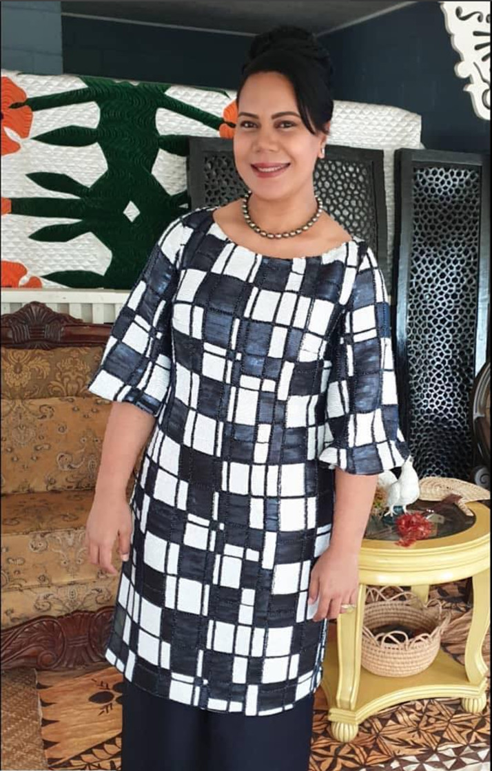 Honourable Frederica T Filipe wearing a dress designed by Beau which she wore to meet the Duke & Duchess of Sussex