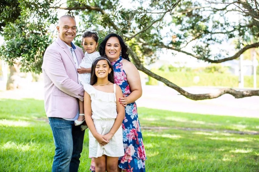 Efeso with his family. Photo Credit: Womans Day