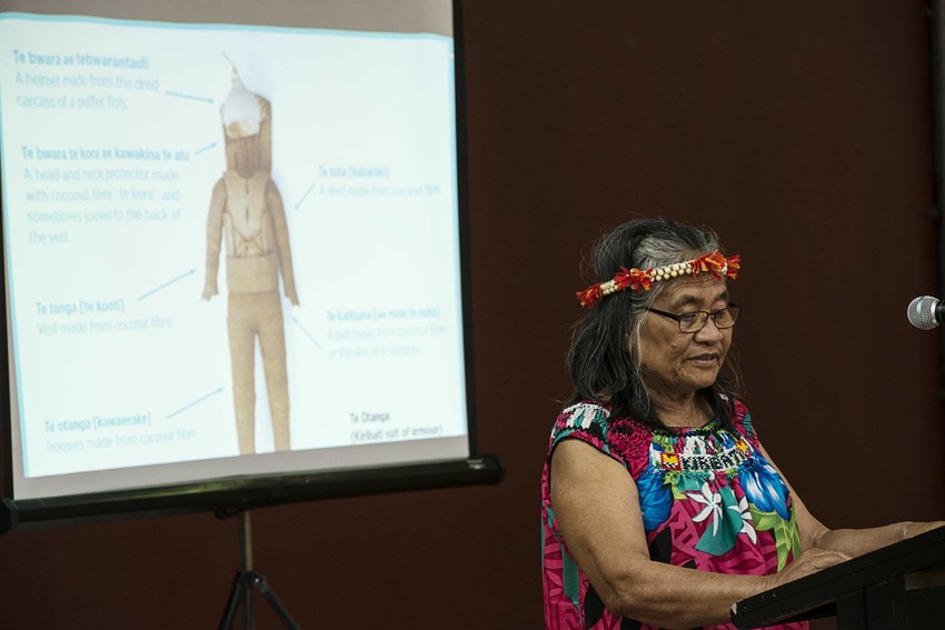 Kaetaeta Watson with a diagram of the armour in the background