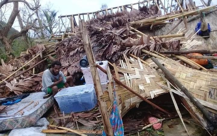 A man searches the wreckage of his house in Ranwas, Pentecost. Photo: The Tanbok Project / Dickson Tari